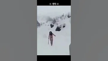 Sadhu Living Under Snow In Himalayas And Indian Army 