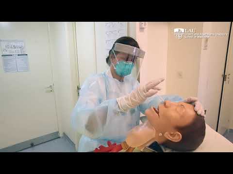 Conducting a nasopharyngeal swab test for COVID-19 Conducting a nasopharyngeal swab test for COVID-19