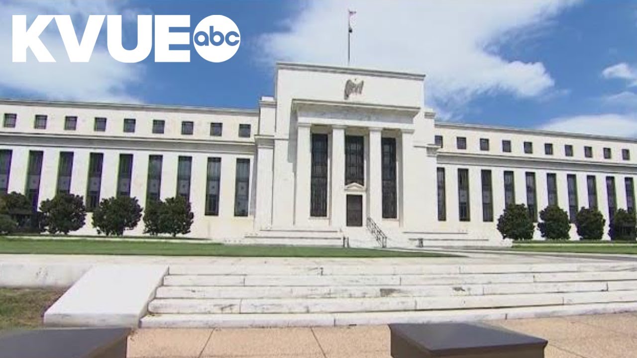 Federal Reserve cuts key interest rate - YouTube