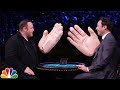 Jimmy Fallon and Kevin James slap each other with giant hands