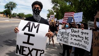 People protest the recent police killing of george floyd during a
march in los banos, calif., on tuesday, june 2, 2020. floyd, an
unarmed black man, died aft...