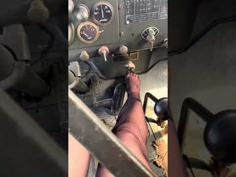 Trying to pump start engine troop carrier truck nylon feet pedal pumping 1945 army vehicle