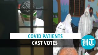 Kerala local body polls: Covid-19 patients cast votes donning PPE kits