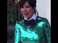 Kris jenner dancing in a sparkly green outfit
