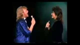 Laura Branigan & John Farnham: I Want to Know What Love Is (improved Hi-Fi)
From April 1986 Australian TV Logies special. What an awesome duet I thought this was. Laura had several hit records in the early to mid 1980s while John Farnham was about to establish a major comeback by the end of the year in Australia. Unfortunately this was only performed on television and no studio recording of this was made. You Yanks and Poms watching this, should try and listen to Farnhams Laura Branigan & John Farnham: I Want to Know What Love Is (improved Hi-Fi)