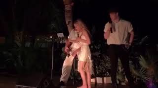 Zach Herron and Kay Cook singing