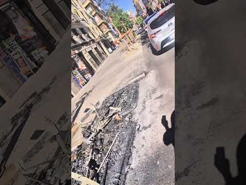 llaman un contenedor de basura en centro de Madrid en plaza Tirso de Molina
