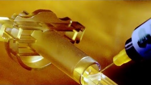 Adhesives, protective materials and processing equipment for medical device assembly