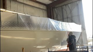 Prepping and applying Awlgrip HighBuild primer on a 1953 Hinckley 41￼