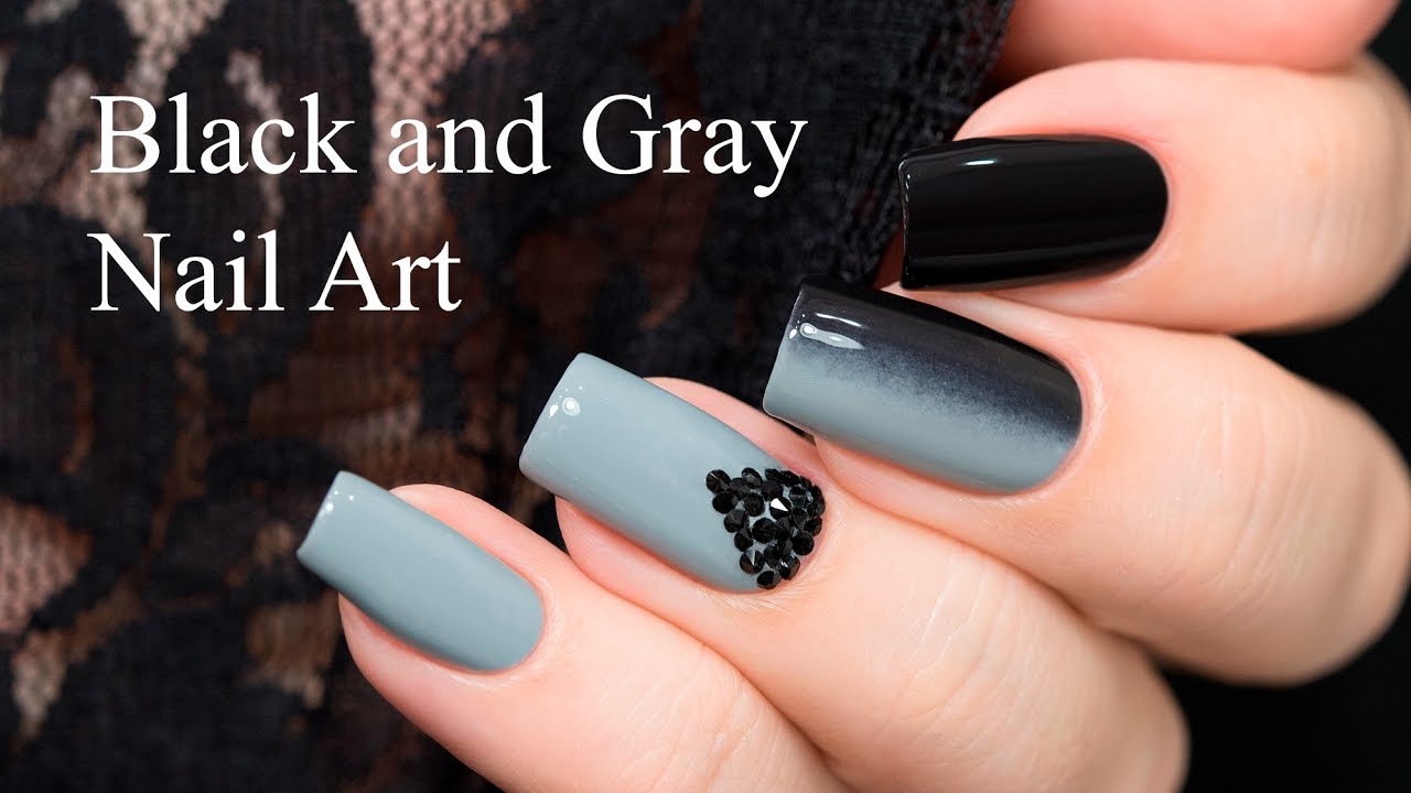 Elegant, dark gray nail design with silver and white details. | Grey gel  nails, Grey nail designs, White and silver nails