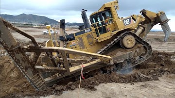 CAT D10T Dozer  ripping and pushing rock. Great operator!