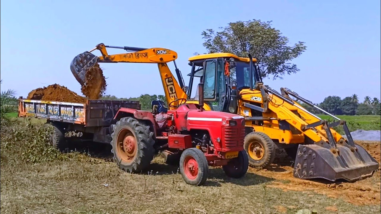 New Jcb 3dx Backhoe Loader Machine Loading Red Mud In Mahindra 295 DI ...