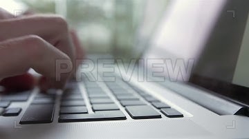 Man Typing On Laptop Computer | Stock Video - Motion Array