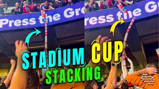 Football Fans Engage in ‘Beer Stacking’ in a Stadium