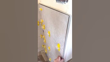 Bending schluter trim over doing a miter #diy #tiling #bathroomdecor #tilingtips #howto #tile