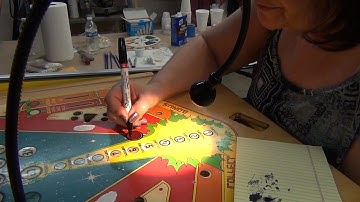 How to Clean and Restore a Pinball Machine Play Field