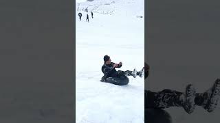 Guy Unintentionally Collides With Two People While Going Down on a Slide