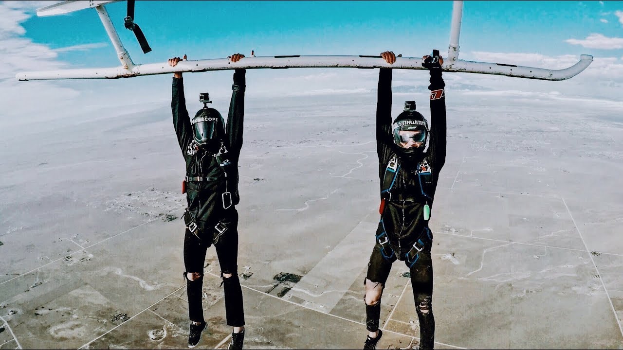 GUY FALLS OFF HELICOPTER AND LOSES SHOE!!!  HELICOPTER SKYDIVE - DASH4 PRODUCTIONS