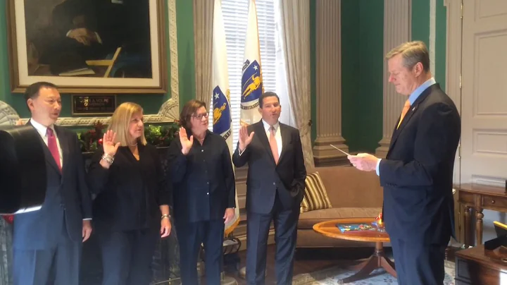 Gov. Baker swears in new members of UMass board of...