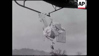 Hiller UH-12 placed a weather-cock on the belfry of a church in Switzerland