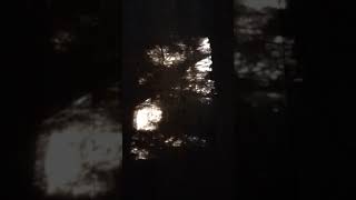 light dancing on an old barn floor through a window