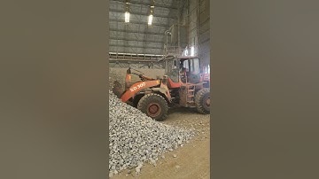 wheel loader feed stone to hopper