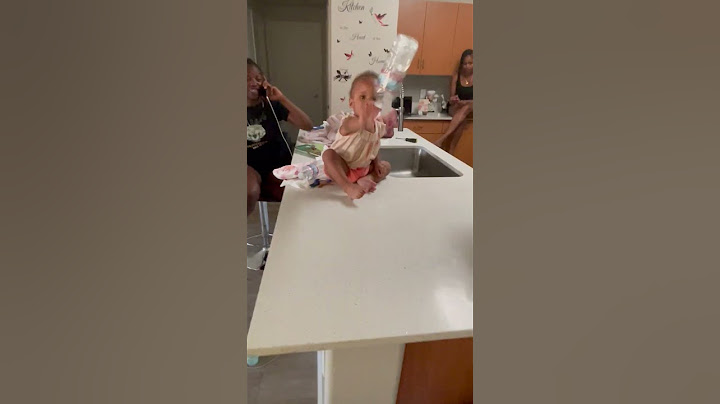 Hilarious! One-year-old girl lands bottle flip TWICE