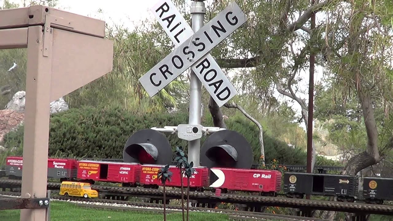 G Scale Southern Pacific Train In Front of Railroad Crossing Signal