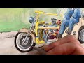 Outlining my watercolor painting of two bull terrier bikers on a motorcycle