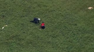 Helicopter Crew Member Tackles Suspect in Chase