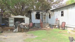 Woman charged with arson after mobile home fire