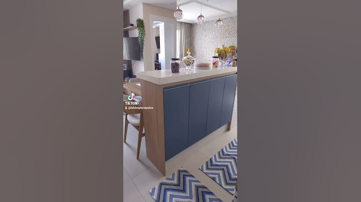 Cozinha Americana e sala integrada com móveis da Biblos Planejados #biblosplanejados #cozinha