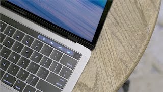 Quick Tip: access System Preferences using Option key + Touch Bar Resimi