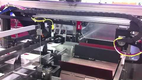 Econocorp Spartan Cartoner with Bucket Conveyor & Overhead Pivoting Infeed for Packs of Yogurt