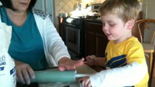 Tristan and Grandma making sugar cookies - November 2009