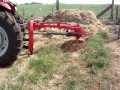 Case IH Farmall 105A avec une tarière agram vrille 600