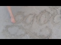 calligraphy on the beach