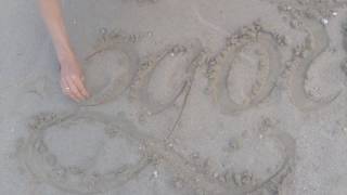 calligraphy on the beach