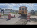 School bus drives through closed road
