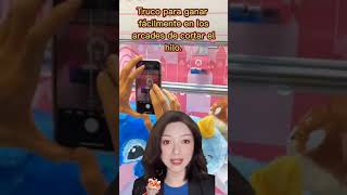Truco para sacarle los premios a máquinas arcade de cortar hilos.