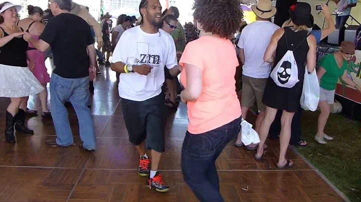 AJ Gibbs and Cat Christ dancing to Andre Thierry a...