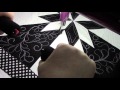 Ann Quilting white thread on black.