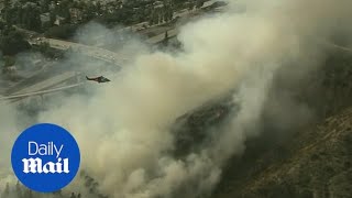 5-Acre brush fire burns along 134 freeway In Eagle Rock