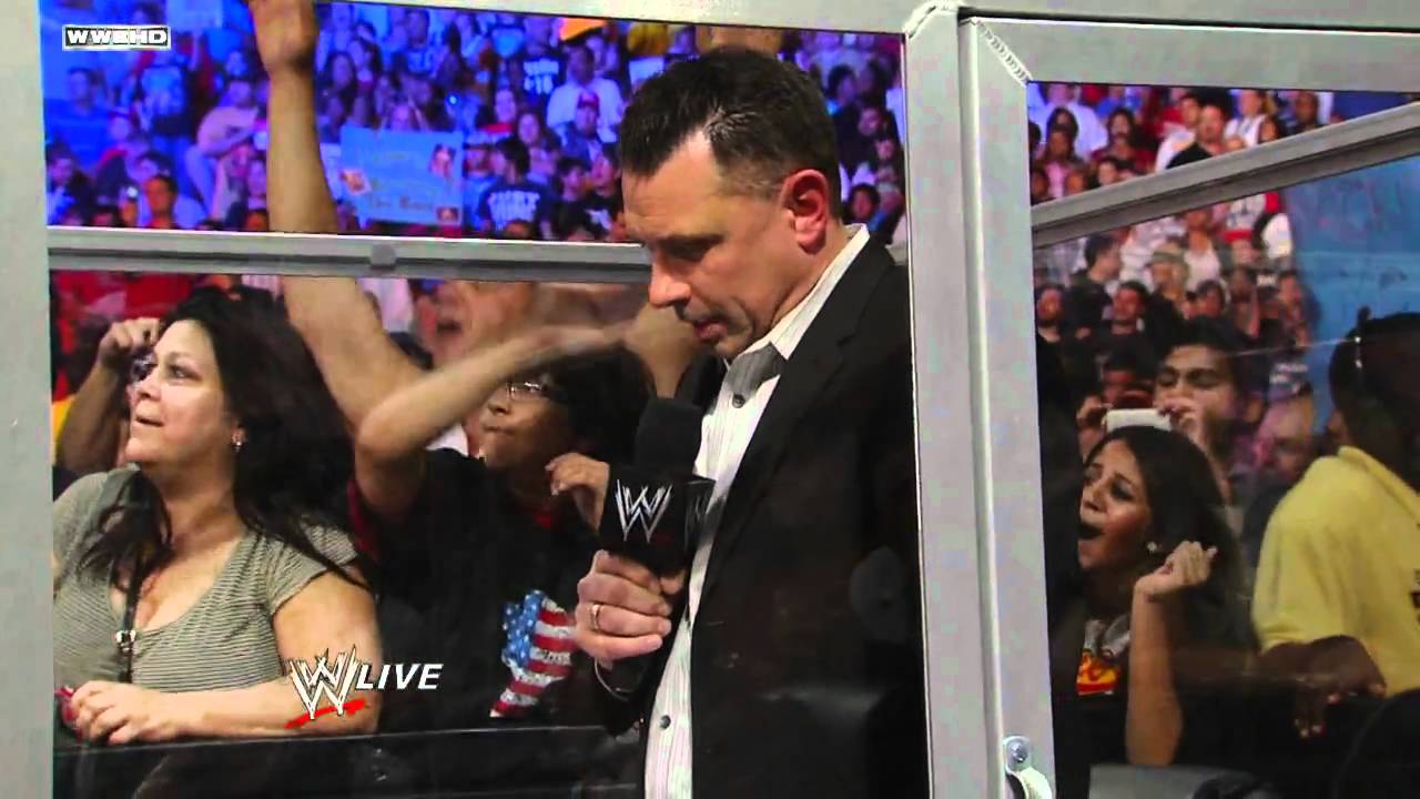 Raw:  The Rock birthday bashes Michael Cole