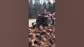 Tractor Plowing Field