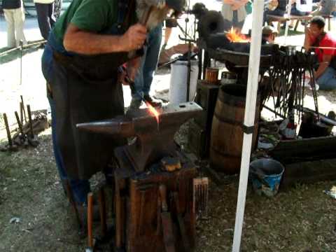 Lloyd Johnston forging at Vieux-Longueuil, Quebec, Canada.