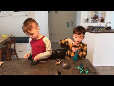 The boys playing with slime toys