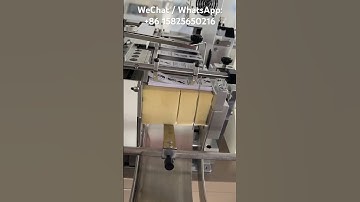 Ultrasonic Label Cutting and Folding Machine for satin ribbon - after center fold 125mm length