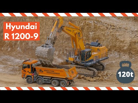 hyundai-r1200-9-cleaning-up-and-loading-trucks-at-a-site-in-luxembourg.