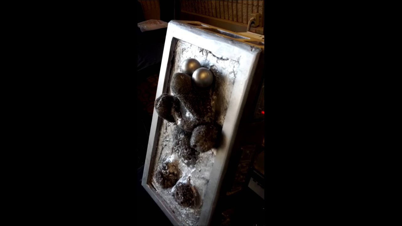 Tickle-me-Elmo in Carbonite